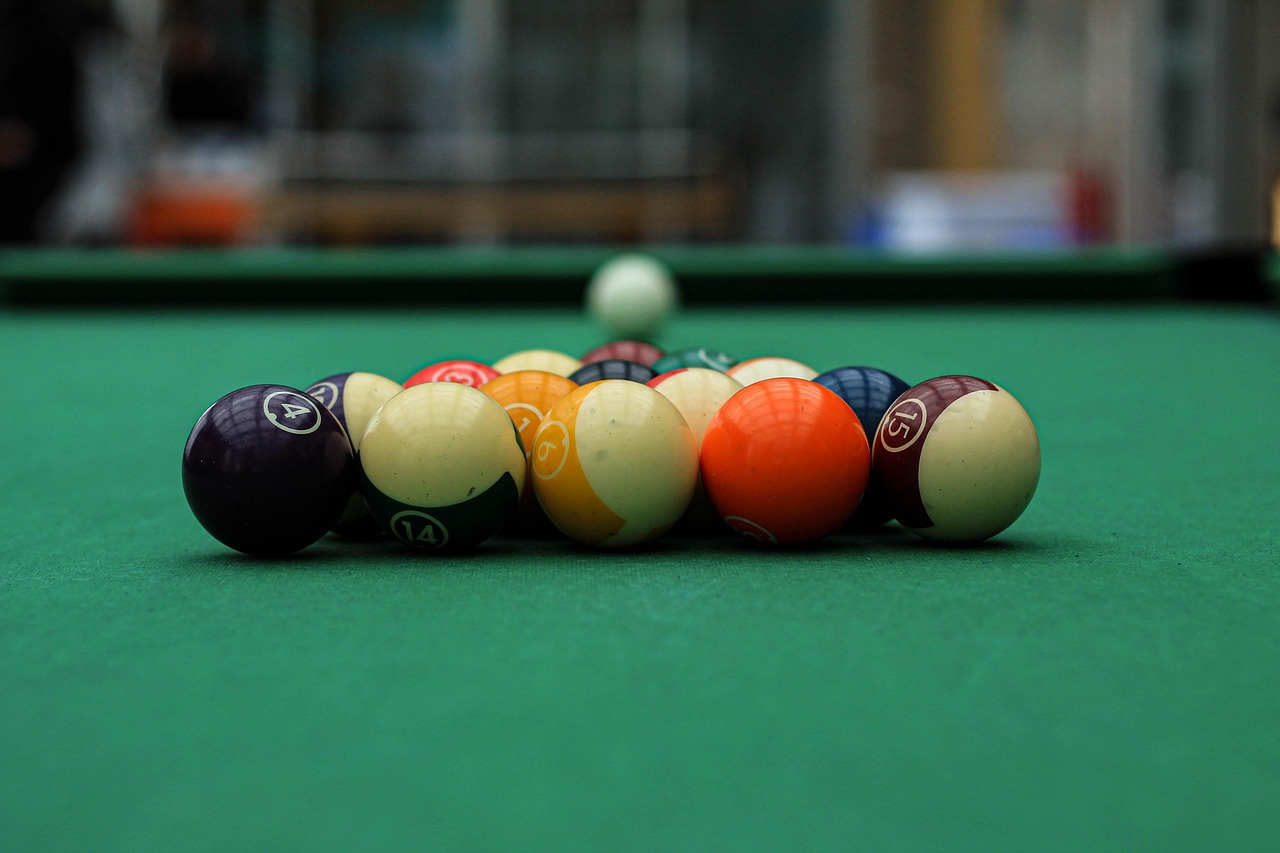 Pool table being carefully moved and transported during relocation